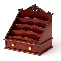 Antique carved mahogany waterfall desk tidy with ivorine drawer pulls (c.1920)