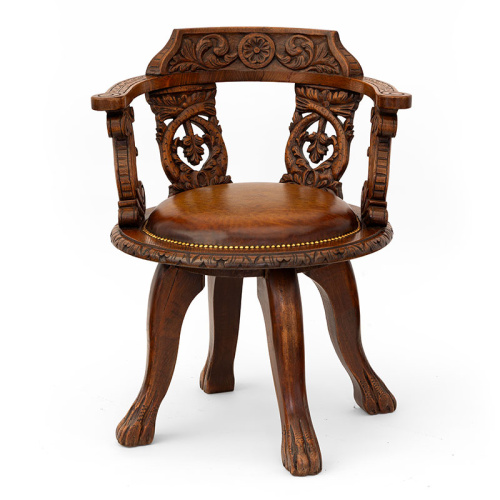 Heavily Carved Oak Ship's Chair with Inset Leather Seat