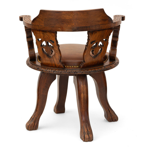 Heavily Carved Oak Ship's Chair with Inset Leather Seat