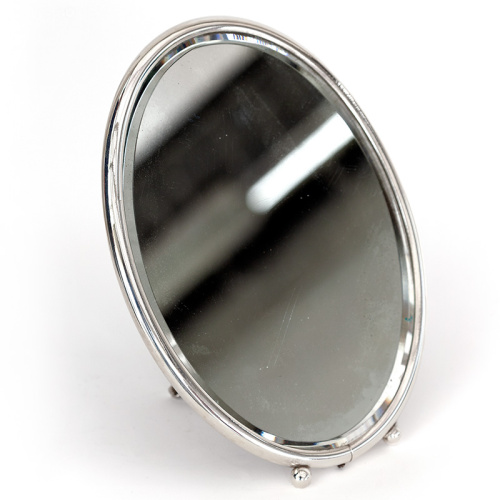 Silver plated oval dressing table standing mirror with bevelled plate and ball feet (c.1890)